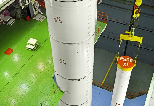 pslvc45core1ststagewithoneofitsstraponsisro